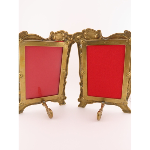 57 - A Pair of Art Nouveau brass picture frames, 8.5