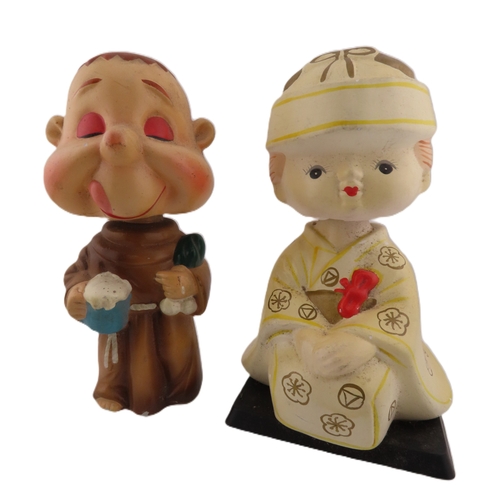 61 - Two Vintage Japanese bobble head figurines.