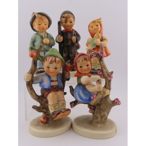 8 - Five Goebel Hummel figurines.