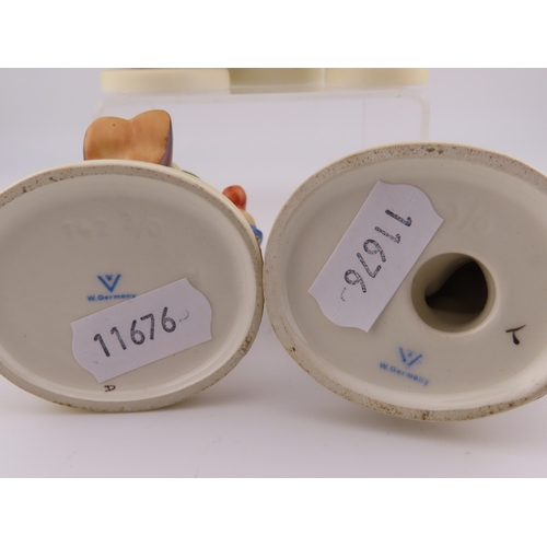 8 - Five Goebel Hummel figurines.