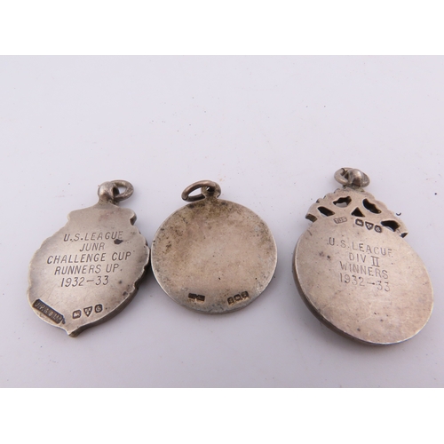 293 - Three sterling silver fob medals, 26 grams total, various designs and inscriptions.