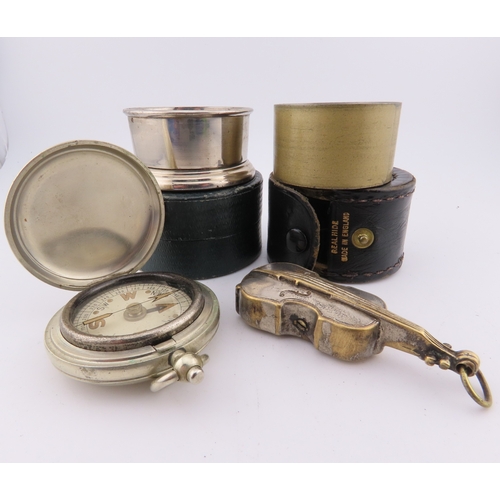 294 - White metal vesta case, folding stirrup cup, tape measure and small compass, assorted early 20th cen... 