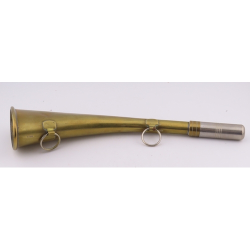 503 - A Brass 9 inch long horn with wall mounting hooks.
