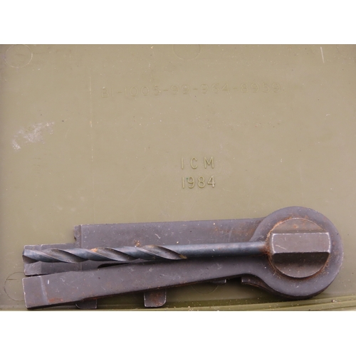 504 - Military issue rifle cleaning kit in olive drab case, complete with tools and rope pull, dated 1968.