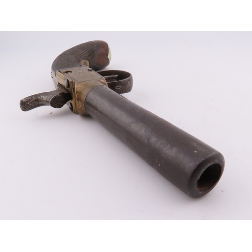 505 - 19th century percussion pocket pistol, engraved brass frame with checkered walnut grip.  Please note... 