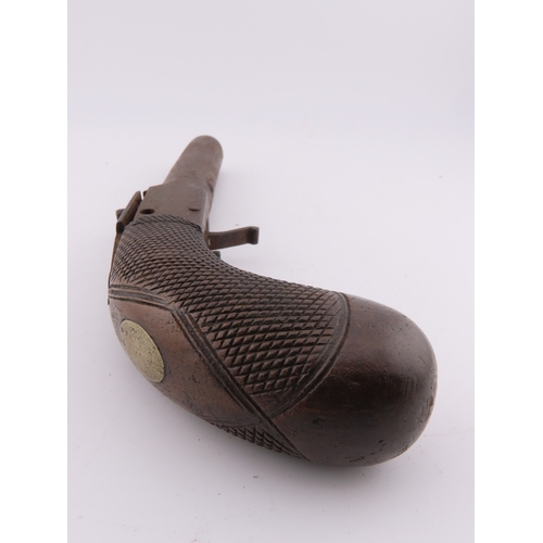 506 - Antique percussion pistol, iron barrel and checkered grip, worn patina. Please note we can only post... 