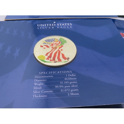 508 - Two Canadian 1oz silver maple leaf coins in cases, together with two USA Millennium Silver Eagles in... 