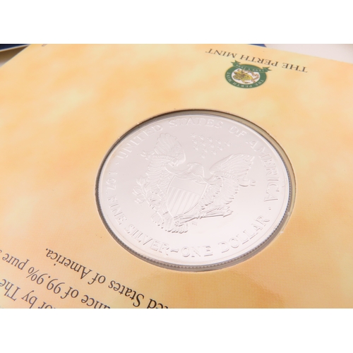 508 - Two Canadian 1oz silver maple leaf coins in cases, together with two USA Millennium Silver Eagles in... 
