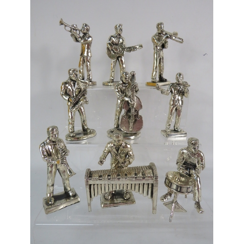 468 - Set of metal jazz band musician figures with instruments including saxophone, trumpet, and drums, ea... 