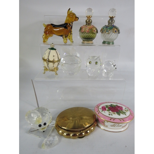472 - Collection of decorative glass and crystal ornaments including perfume bottles, animal figures, and ... 