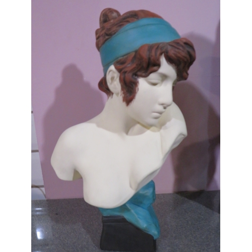 483 - Decorative ceramic bust of a young woman with reddish-brown hair and a turquoise headband and drape,... 