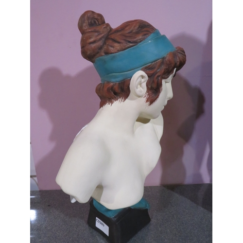 483 - Decorative ceramic bust of a young woman with reddish-brown hair and a turquoise headband and drape,... 