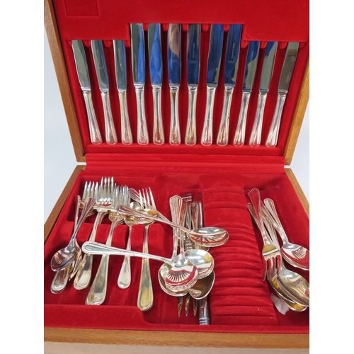 495 - Cased canteen of silver-plated cutlery, approx. 16 by 11 by 3 inches.