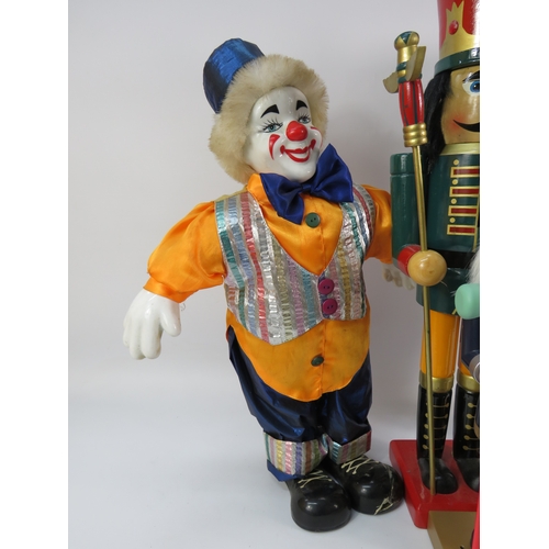 497 - Set of traditional wooden nutcracker figures and clown, tallest approx. 25 inches (clown with broken... 