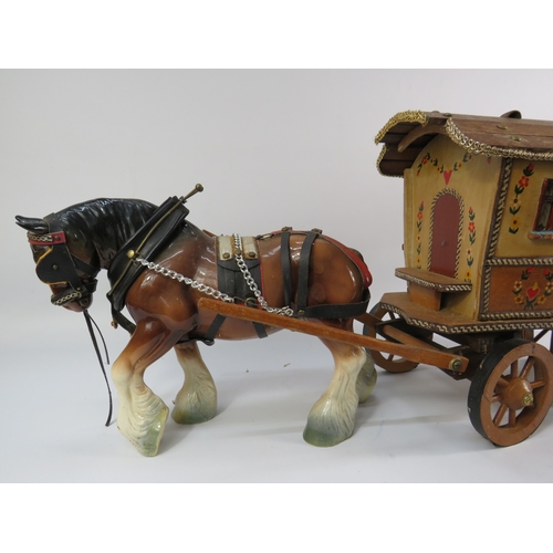 499 - Painted model of a horse and gypsy caravan, approx. 30 inches long.