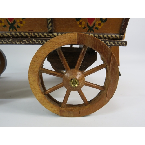 499 - Painted model of a horse and gypsy caravan, approx. 30 inches long.