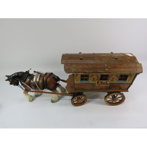 499 - Painted model of a horse and gypsy caravan, approx. 30 inches long.