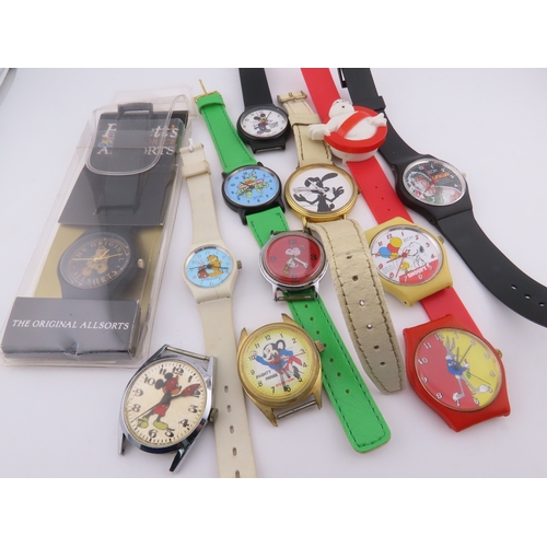 513a - Assorted novelty and character wristwatches, including Disney, Snoopy, and others.