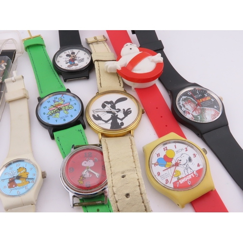 513a - Assorted novelty and character wristwatches, including Disney, Snoopy, and others.
