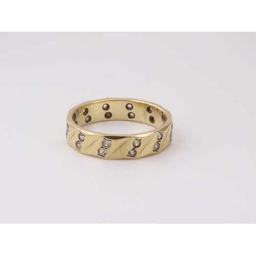 9ct Gold Diamond Eternity Ring with a continuous diagonal pattern of ...