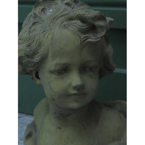 75 - A Classical Style Bust 13 inches high A sculptural bust of a young child made from composite stone w... 
