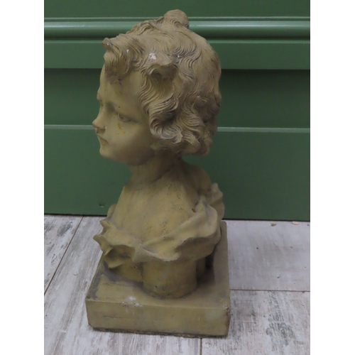 75 - A Classical Style Bust 13 inches high A sculptural bust of a young child made from composite stone w... 