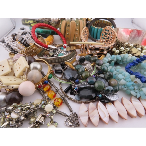 78 - A Collection of Bracelets including Semi Precious Stones A diverse selection incorporating glass bea... 