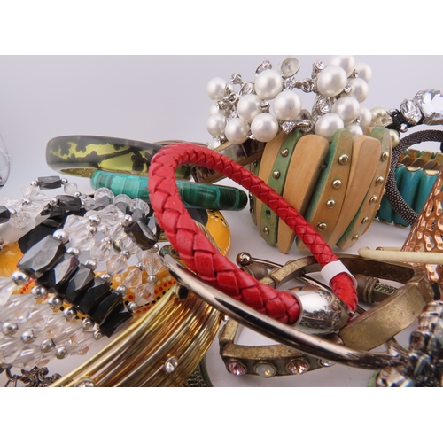 78 - A Collection of Bracelets including Semi Precious Stones A diverse selection incorporating glass bea... 