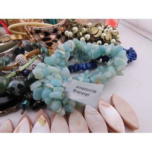 78 - A Collection of Bracelets including Semi Precious Stones A diverse selection incorporating glass bea... 