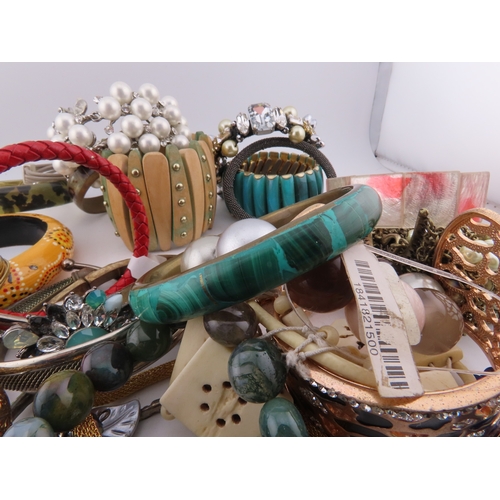 78 - A Collection of Bracelets including Semi Precious Stones A diverse selection incorporating glass bea... 