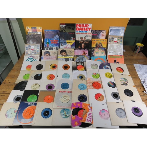557 - Large collection of 85+ vinyl 7-inch singles (45 RPM records) featuring various artists predominantl... 