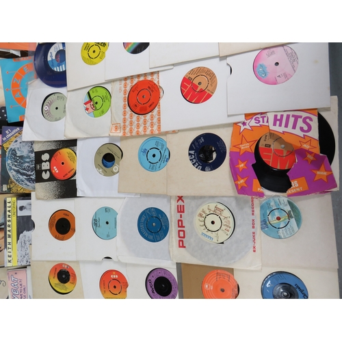 557 - Large collection of 85+ vinyl 7-inch singles (45 RPM records) featuring various artists predominantl... 