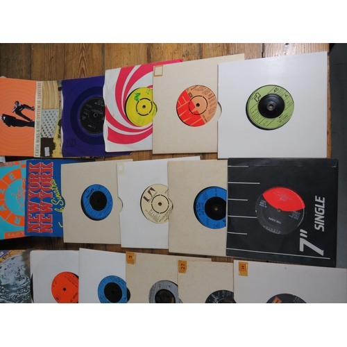 557 - Large collection of 85+ vinyl 7-inch singles (45 RPM records) featuring various artists predominantl... 