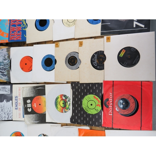 557 - Large collection of 85+ vinyl 7-inch singles (45 RPM records) featuring various artists predominantl... 
