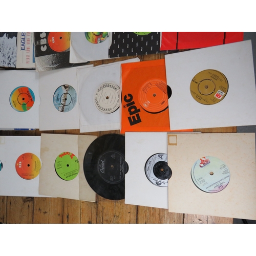 557 - Large collection of 85+ vinyl 7-inch singles (45 RPM records) featuring various artists predominantl... 
