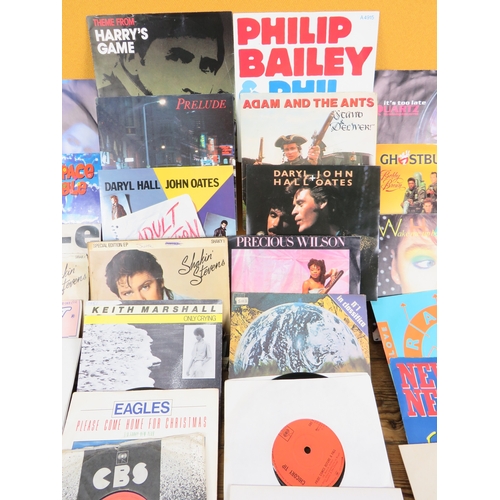 557 - Large collection of 85+ vinyl 7-inch singles (45 RPM records) featuring various artists predominantl... 