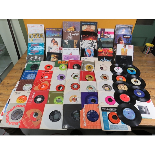 560 - Collection of 90+ vinyl 7-inch singles (45 RPM records) featuring various artists from 1960s-1990s. ... 