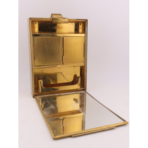 110 - A Park Lane gilt metal cigarette and compact case, circa 1930, the hinged case opening to reveal twi... 