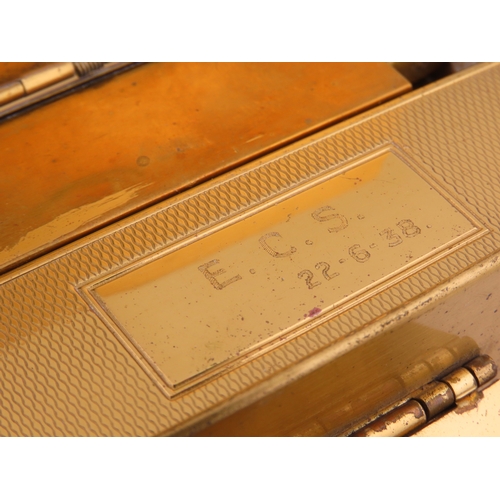 110 - A Park Lane gilt metal cigarette and compact case, circa 1930, the hinged case opening to reveal twi... 