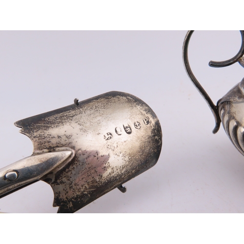 124 - A Georgian silver Stilton scoop with polished bone handle, together with a silver-handled cake knife... 