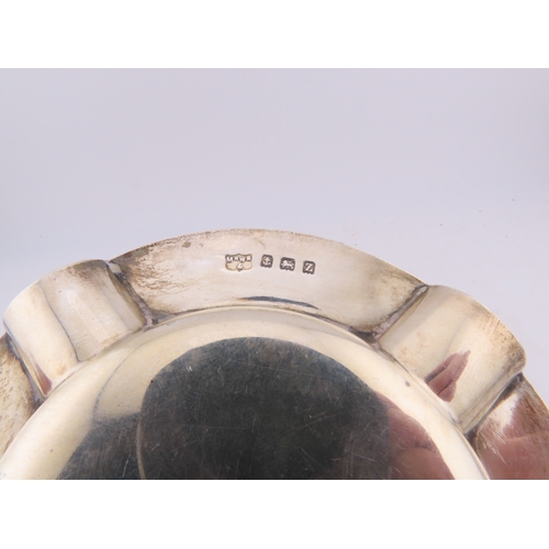 125 - A Mappin & Webb sterling silver ashtray, Birmingham 1924, of circular form with engine-turned decora... 