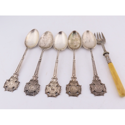 129 - A group of five Sheffield-hallmarked souvenir teaspoons, each with ornate cast terminals depicting c... 