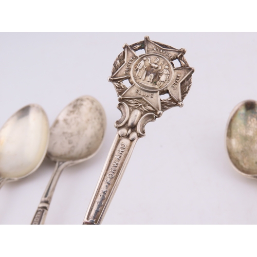 129 - A group of five Sheffield-hallmarked souvenir teaspoons, each with ornate cast terminals depicting c... 