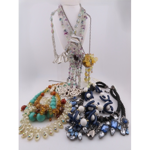 83 - Collection of necklaces A substantial group of costume necklaces comprising faceted bead strands, fl... 
