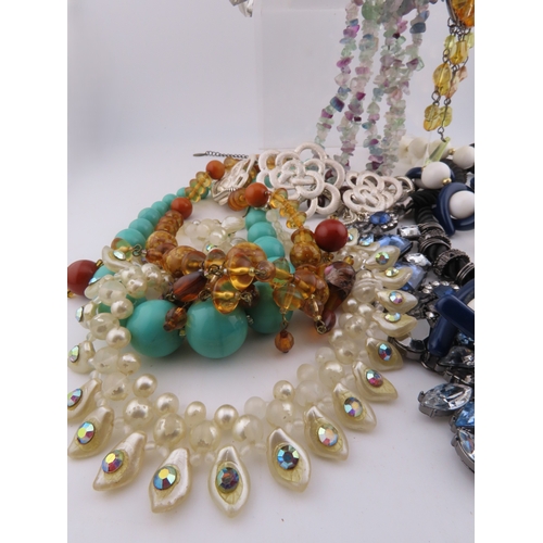 83 - Collection of necklaces A substantial group of costume necklaces comprising faceted bead strands, fl... 