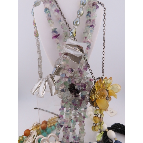 83 - Collection of necklaces A substantial group of costume necklaces comprising faceted bead strands, fl... 