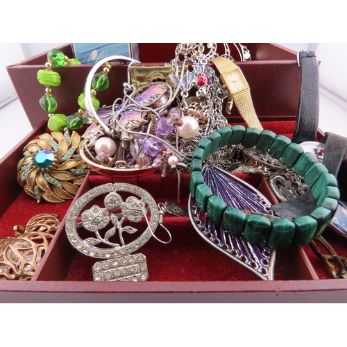 90 - A collection of vintage and modern costume jewellery, comprising a mixed selection of pendants, bang... 