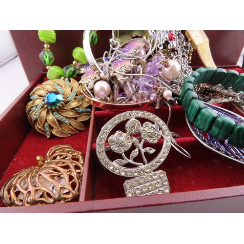 90 - A collection of vintage and modern costume jewellery, comprising a mixed selection of pendants, bang... 