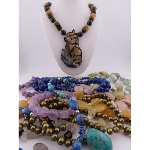 95 - A group of semi-precious stone necklaces, including amethyst, turquoise, lapis lazuli, quartz, agate... 