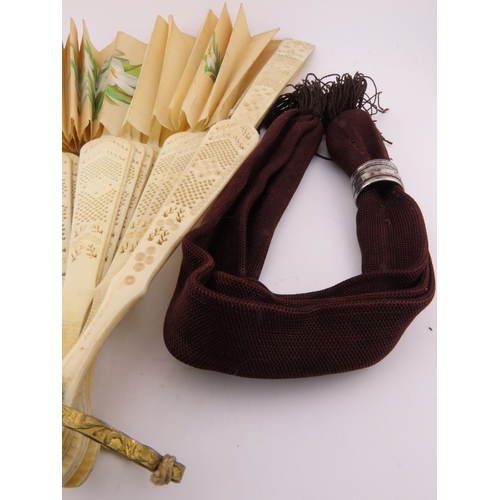 132 - Two Victorian misers purses and a vintage fan, A charming group comprising two Victorian misers purs... 